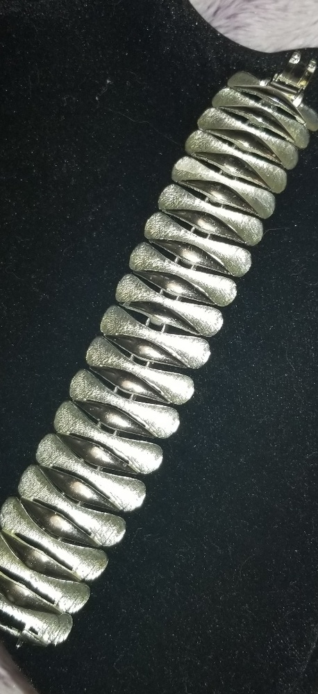Silver bracelet.